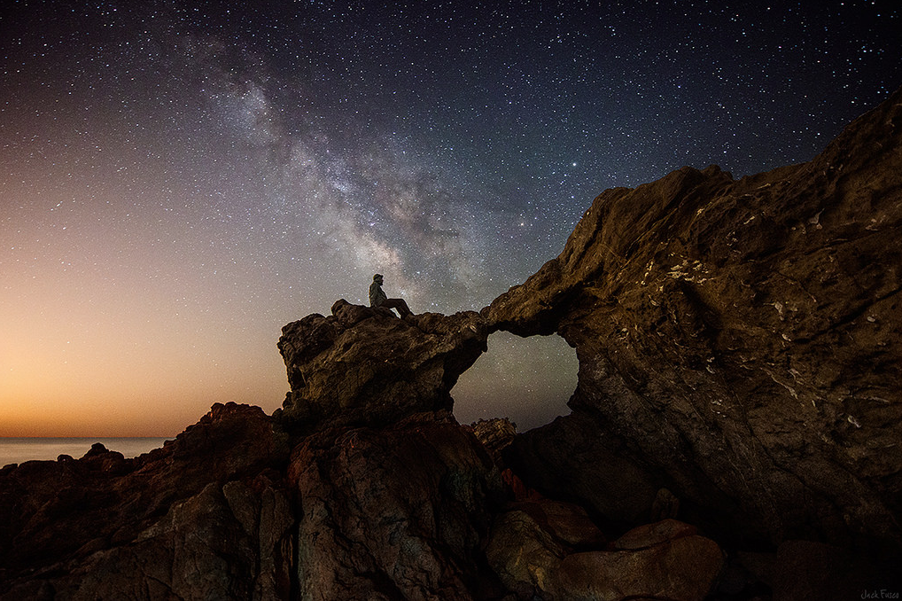 Today's Photo of the Day was captured by Jack Fusco in Malibu, California using a Nikon D800E. Although Fusco <a href="https://www.popphoto.com/how-to/2014/08/how-to-plan-your-night-photography-perfect-star-trails/">regularly photographs</a> the starry night skies of the east coast he says this was his first time shooting the Milky Way over the Pacific Ocean. Although we are always suckers for a good astronomy photo, we liked that Fusco decided to include a human element to the scene. See more of Fusco's work <a href="https://www.flickr.com/photos/xclearmindx/">here.</a>