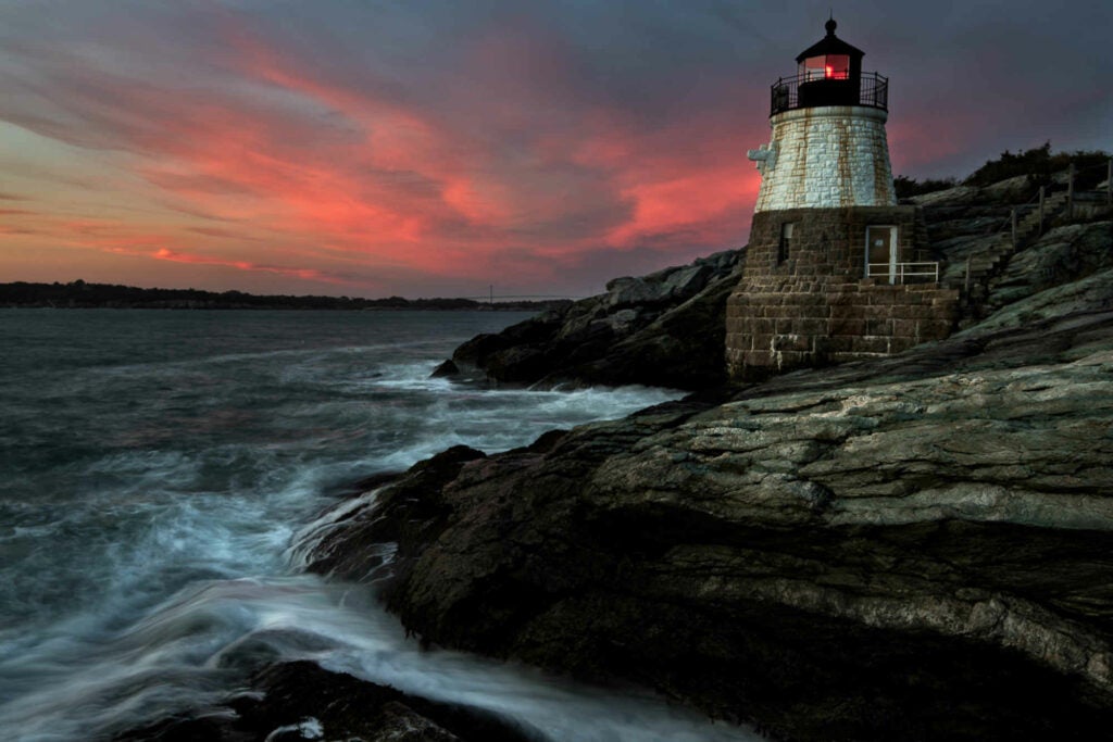 This was taken on a recent trip to Newport Rhode Island.  The plan was to be there from sunset through early blue hour evening.  For a bout two minutes, the sky lit up into the beautiful tones and hues represented in the photograph.  Fortunately my pre scout of the area for preferred compositions paid off when the moment arrived. The image consists of a blend of two RAW files, mostly for water texture effect. Then further processing in lightroom and photoshop.