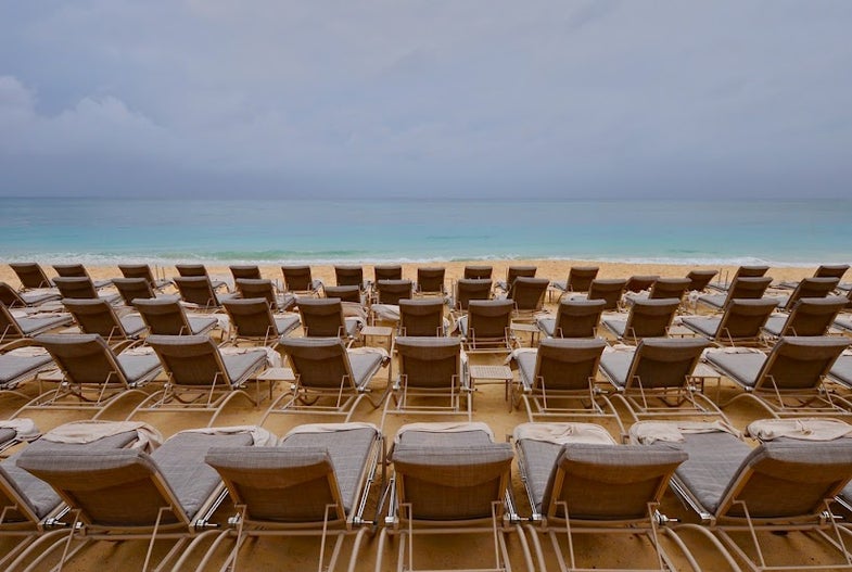 When and where was the photo taken? May, 2012, The Cayman IslandsWhat camera and lens were used? Nikon D90 with a 10-24mm lens.Tech specs: ISO 200, 1/200 sec, f/7.1Processing: Minor contrast, saturation tweaks made in iPhotoDescription: Deserted beach on a cloudy day. Want to see your photo picked as our Photo of the Day? Sumbit it HERE.