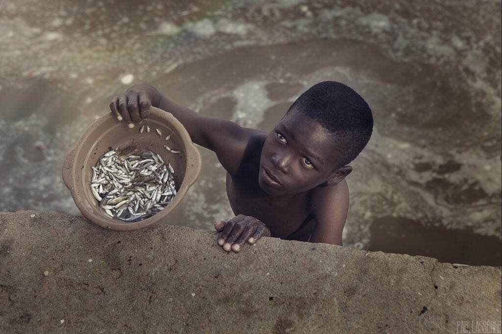 Today's Photo of the Day comes from Fabien Lasserre and was taken in Togo, Africa. Lasserre shot this portrait using a Canon EOS 5D Mark II with a EF24-70mm f/2.8L USM lens at 1/320 sec, f/5.6 and ISO 320. See more work <a href="http://www.flickr.com/photos/fabshooting/">here.</a>