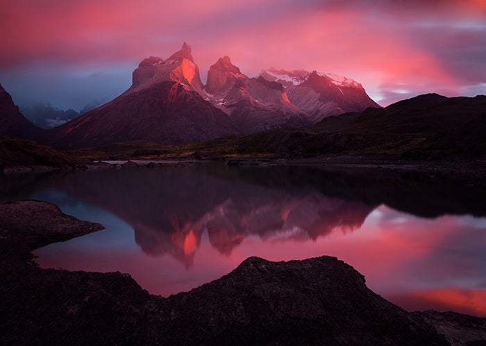 Los Cuernos at dawn during fiery sunrise, Torres del Paine National Park, Patagonia, Chile.