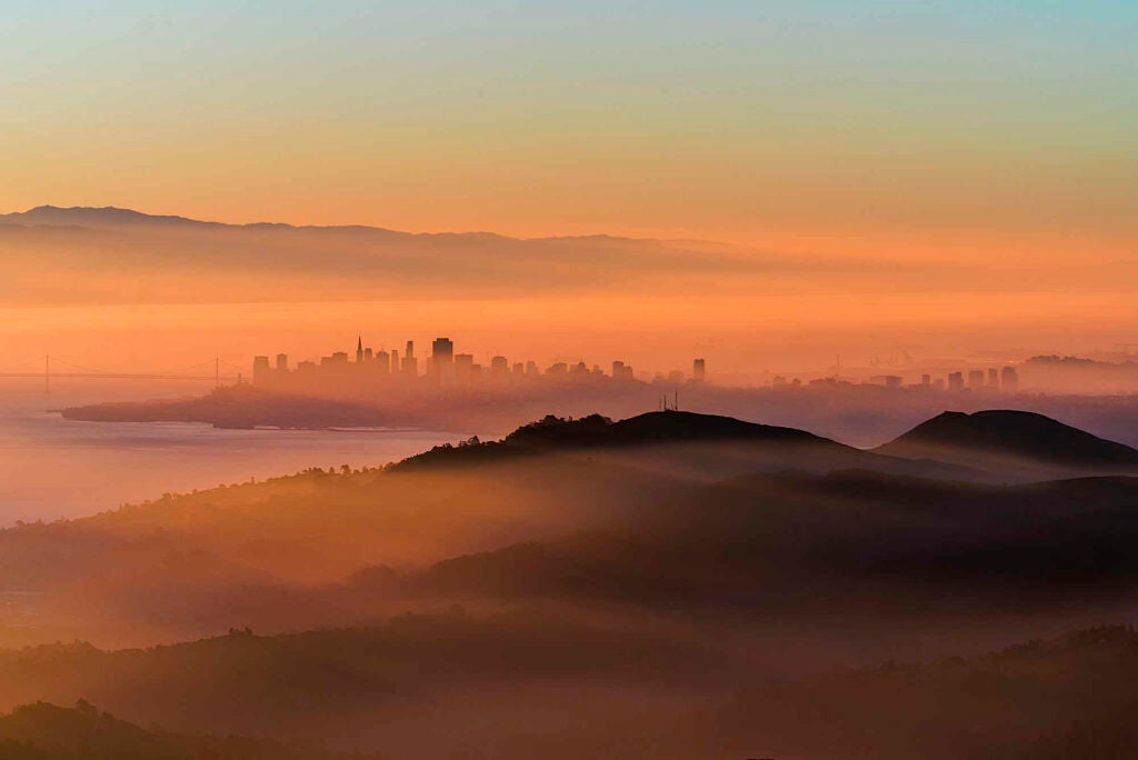 Drove to Mt. Tamalpais, 30mins north of San Francisco, on a whim one morning hoping for some magic. The moments before sunrise were fairly lackluster, but as soon as the sun began to rise, fog approached and quickly engulfed the city in the distance. This was taken with a Nikon D610 at 200mm with a Nikon 70-200f4. I added a 10stop NR filter for some additional motion in the fog, which contributed to the color casting (which I actually prefer!).