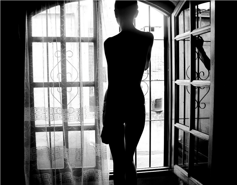 Today's Photo of the Day was submitted to our Flickr group by Lucy Marti. The high-contrast black and white works excellently with the scene, which is already rich with contrast. Leaving the subject in the shadow and rendering her as a silhuoette takes some of the overt sexuality out of the photo and makes it more subtle, relying more on the shape and pose rather than flesh tones. You can see more of Lucy's work (some of which is NSFW) on her <a href="https://www.flickr.com/photos/lucianamarti/with/14226385018/">Flickr feed</a>.