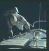 astronaut fixing ship