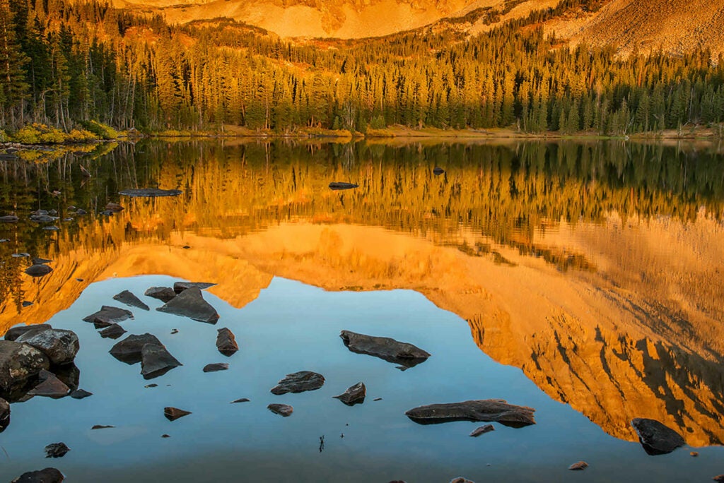 Sunrise on Mitchell Lake in the Indian Peaks Wilderness in Colorado.