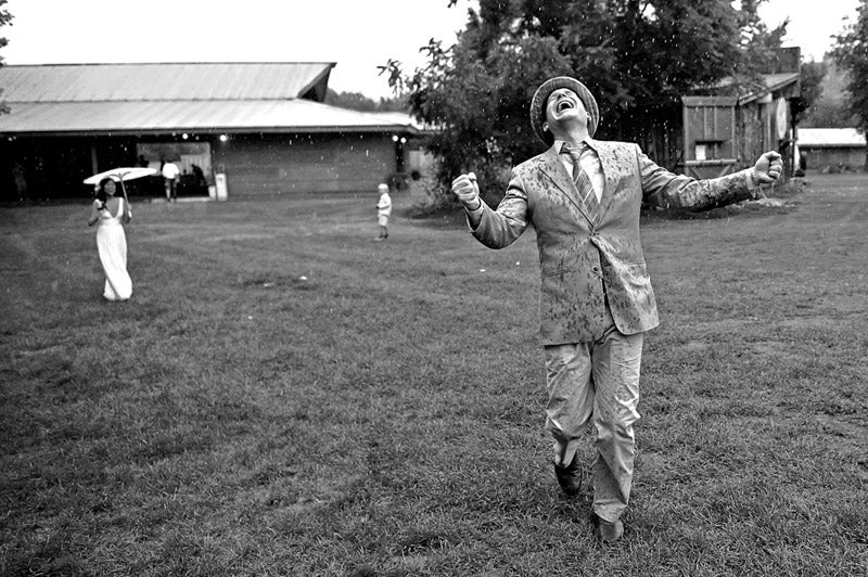 Photographer Sergio gulped when it started to rain, but the wedding party didn't let it dampen their spirits. The lesson: Always follow the action wherever it leads you.