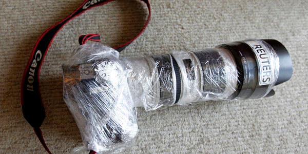 Even Reuters Photographers Make Camera Armor Out of Plastic Wrap