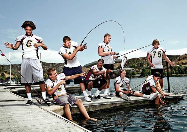 group of people fishing in boat