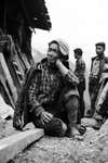 Here is a photo of a survivor the horrible earthquake in Nepal several months ago. His pose and expression reveal how desperate and hurt he is.