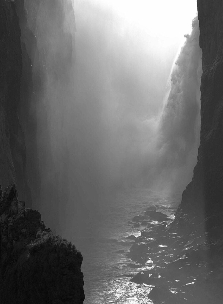 Victoria Falls is one of the largest falls in the world. We visited the falls during the dry season and also during a drought. Only a fairly small portion of the falls was flowing. However, the diminished flow made for spectacular backlighting near sunset on the Zambian side of the falls.