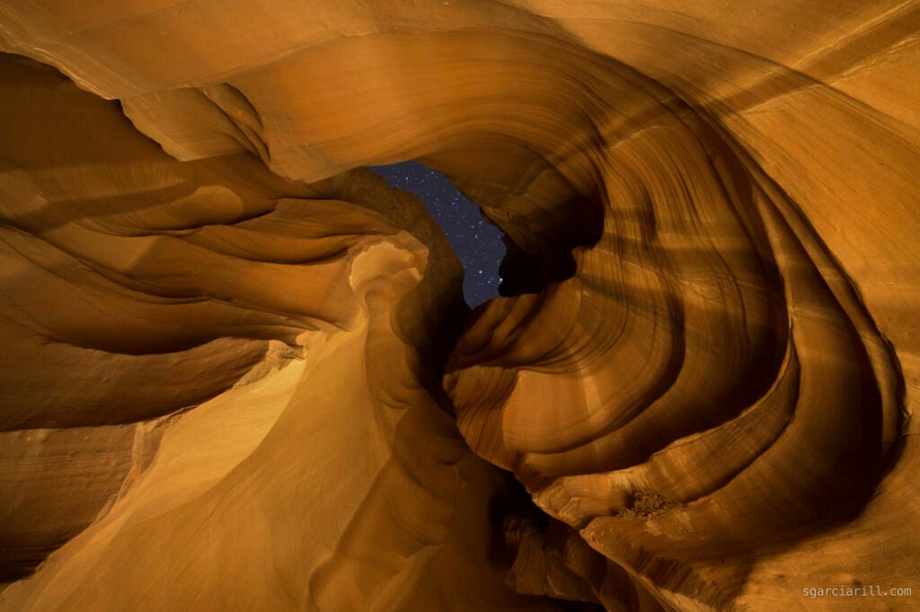 Sergio Garcia Rill had this to say about today’s Photo of the Day: <em>"During my recent road trip to Arizona I had a chance to photograph Upper Antelope Canyon during a night tour, this is one of the photos that I got from that trip. Even though the openings looking at the sky were hard to come by inside the canyon, I still loved the chance to have upper antelope almost all by myself."</em> Sergio shot with a <a href="https://www.popphoto.com/gear/2013/01/camera-test-nikon-d600-full-frame-dslr/">Nikon D600</a> and a <a href="https://www.popphoto.com/category/gear-reviews/">14mm f/2.8 Nikkor lens</a>. His exposure: ISO 1600, f/2.8 with the shutter open for 25 secs. See more of Sergio's work <a href="http://www.sgarciarill.com/">here</a>. Want to be featured as our next Photo of the Day? Simply submit you work to our <a href="http://www.flickr.com/groups/1614596@N25/pool/page1">Flickr page</a>.