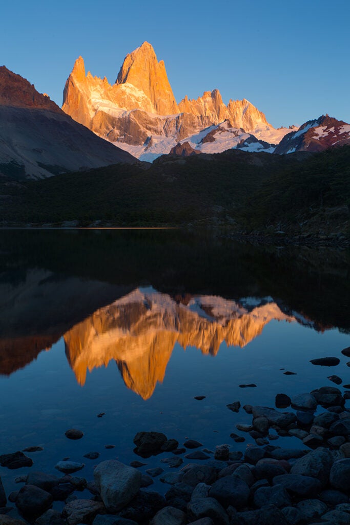 Fitz Roy reflected in Laguna Capri at sunrise, Los Glaciares National Park, Patagonia, Argentina.