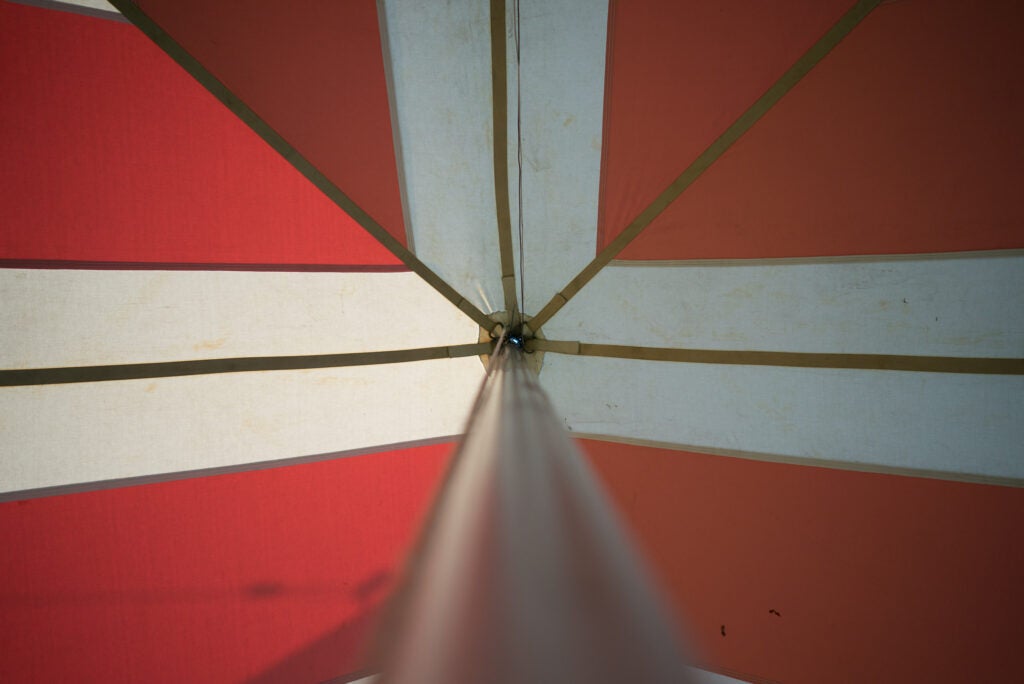 Despite the high-contrast nature of the colors in the tent, you can see that the image starts out pretty flat.