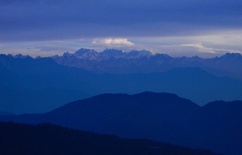 Sougata made today's Photo of the Day at Sandakphu, in Darjeeling, West Bengal, India. He describes the view in great detail on his <a href="http://www.flickr.com/photos/sougatasinha/12514632283/in/pool-1614596@N25">Flickr page</a>. An excerpt of that is below. <em>"Sandakphu 3636 mtr. is 58 km. from Darjeeling and commands one of the most spectacular views. In the foreground is a great basin set in the midst of the hills, the slopes covered with rhododendrons and silver fir trees. In the background is continuous barrier of snowy mountains, the most prominent of which is Kanchenjunga."</em> Think you have what it takes to be featured as Photo of the Day? Submit your best work to our <a href="http://flickr.com/groups/1614596@N25/pool/">Flickr group</a>.