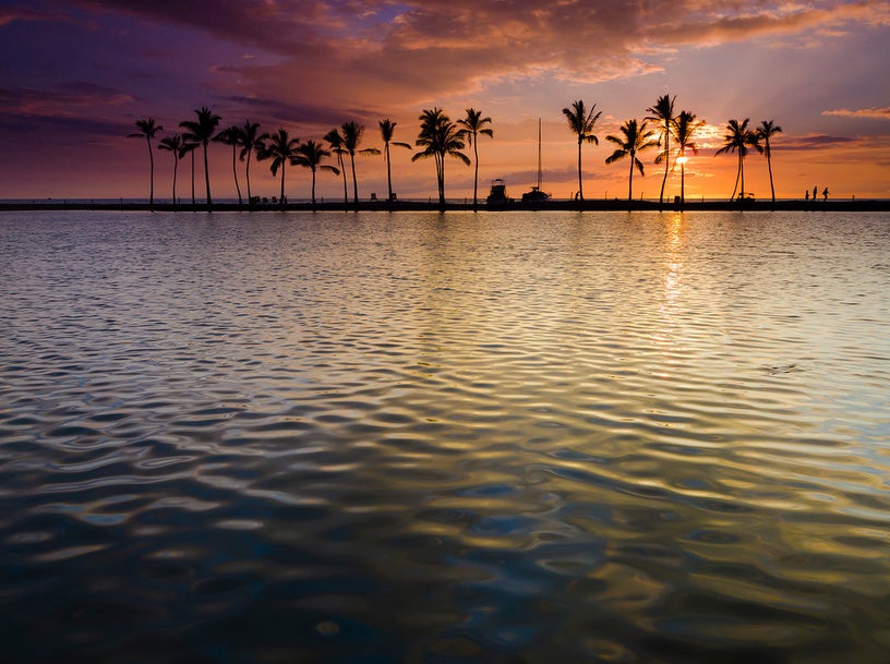 Today's Photo of the Day was captured by Christopher Johnson during a sunset at Anehoomalu Beach in Hawaii. "Originally I would have opted for a slow shutter to blur any water movement, but this time the ripples played a huge role in the foreground," Christopher writes about creating the image. "I dropped the aperture to 8 in order to keep a good depth of field while speeding the shutter enough to freeze the slow moving water." See more of Christopher's work <a href="http://www.flickr.com/photos/fromhereonin/">here.</a>