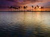 Today's Photo of the Day was captured by Christopher Johnson during a sunset at Anehoomalu Beach in Hawaii. "Originally I would have opted for a slow shutter to blur any water movement, but this time the ripples played a huge role in the foreground," Christopher writes about creating the image. "I dropped the aperture to 8 in order to keep a good depth of field while speeding the shutter enough to freeze the slow moving water." See more of Christopher's work <a href="http://www.flickr.com/photos/fromhereonin/">here.</a>