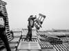 Tossing a pallet on top of Vreugdevuur Scheveningen