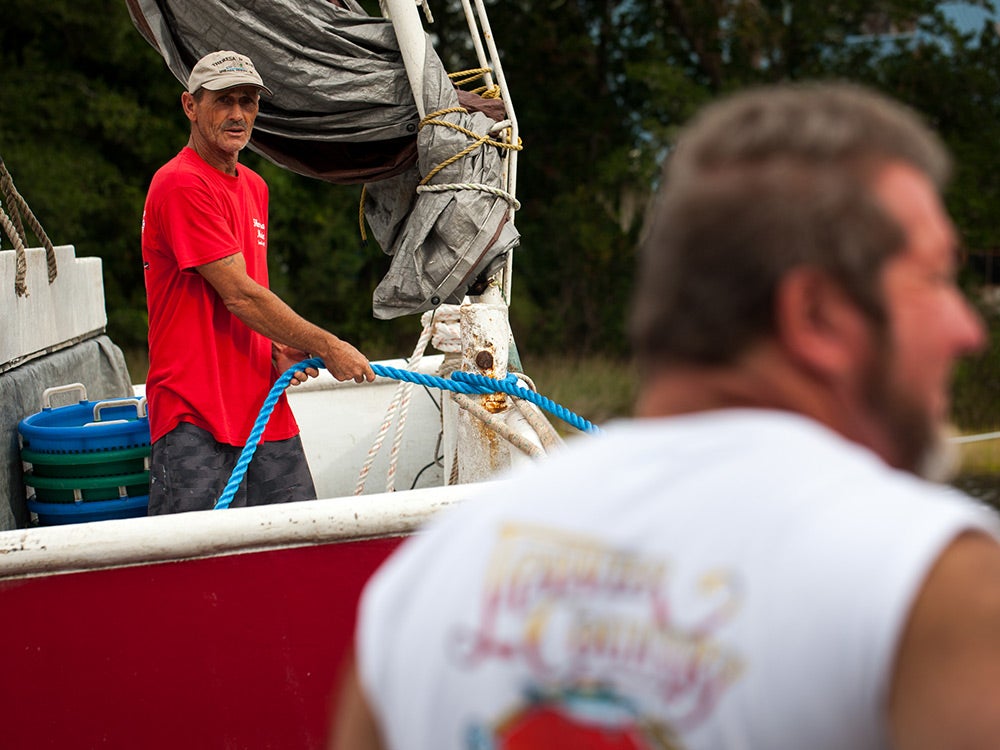 men in boats