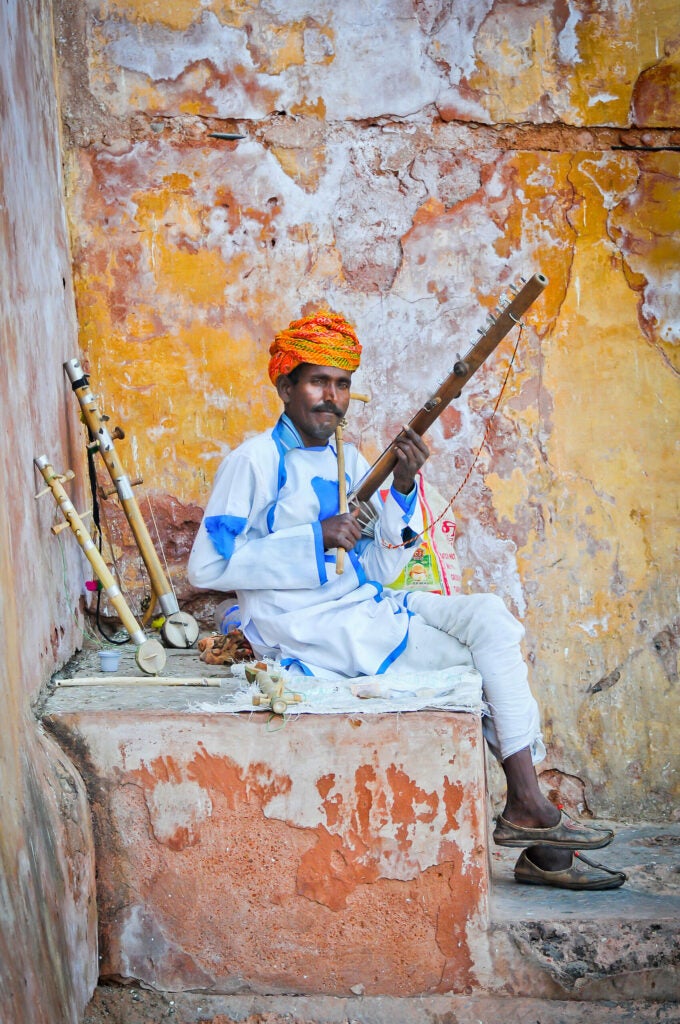 Indian With His Flutes