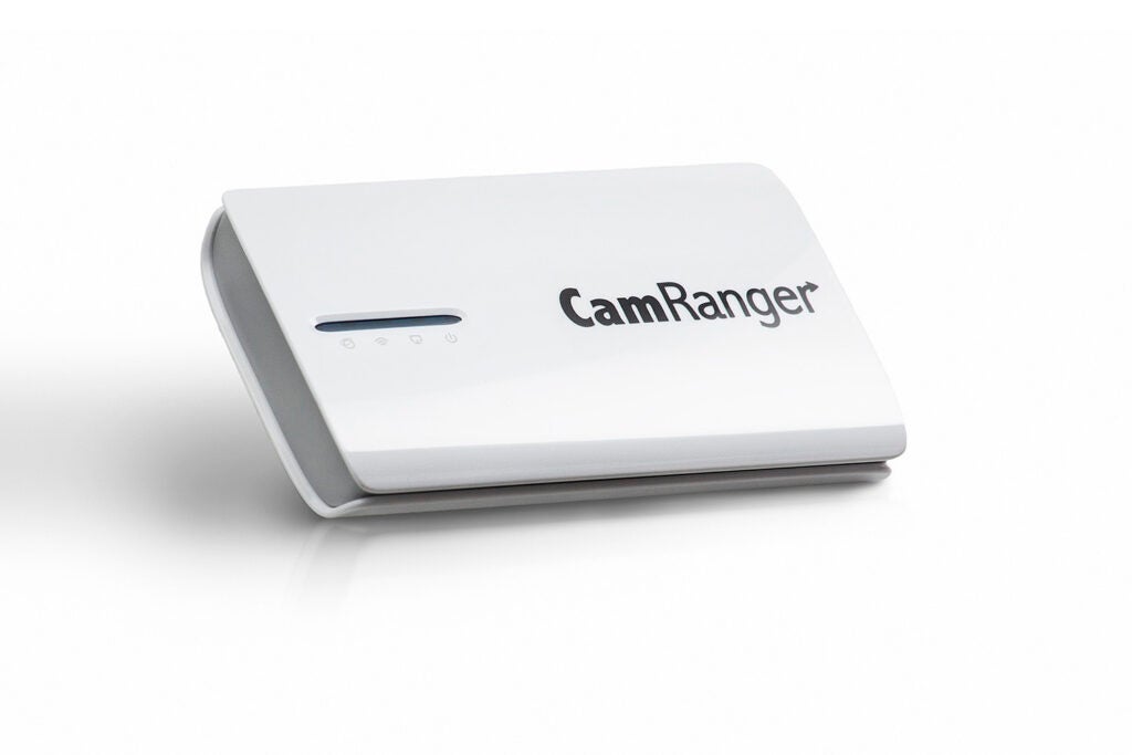 [Camranger](http://camranger.com/): This wirelessly transmitted a live view from the camera to an iPad for real-time image evaluation. $300, street.