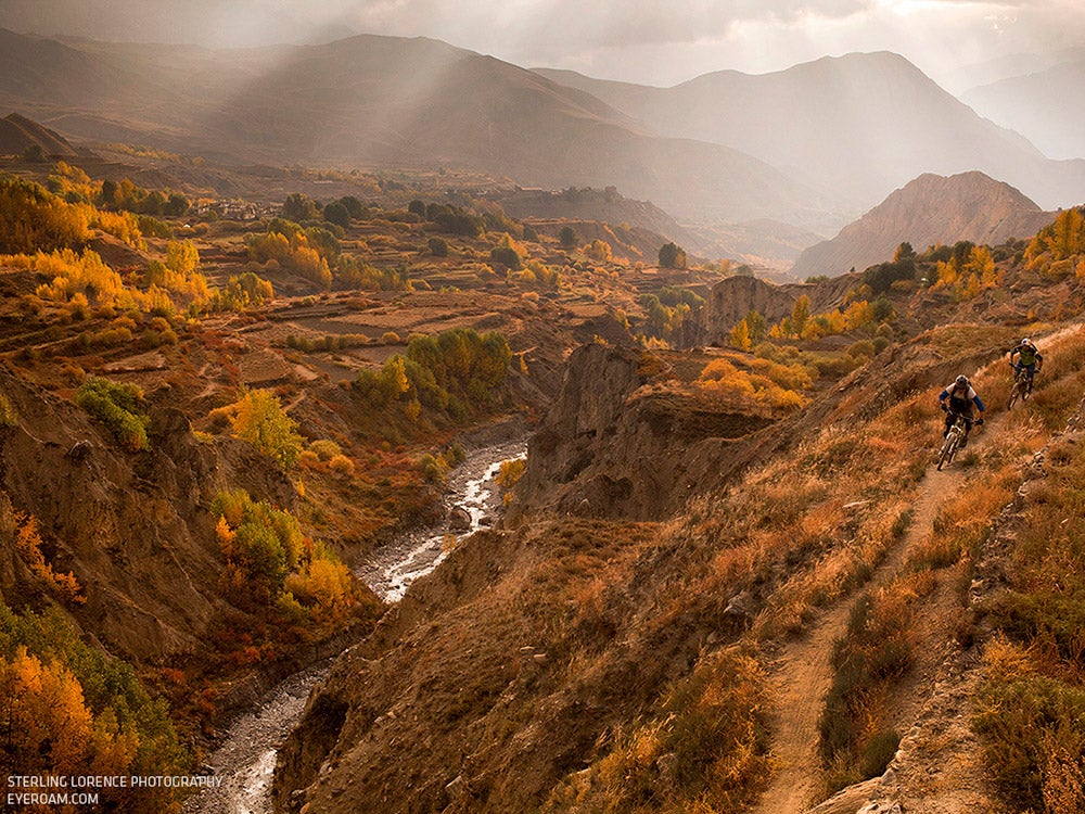 Andrew Shandro and Rene Wildhaber riding near Dzong, Nepal