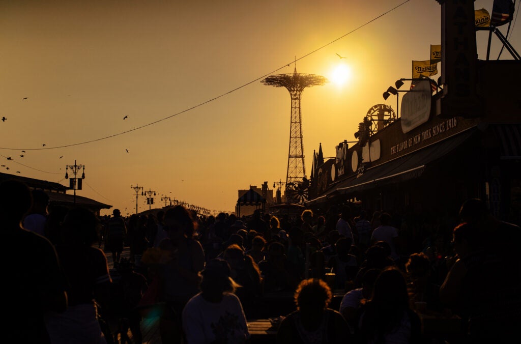 Today's Photo of the Day was taken by Roman Kruglov on Labor Day weekend at Coney Island in Brooklyn. Kruglov used a Sony a7 to capture the busy boardwalk at sunset. See more work <a href="https://www.flickr.com/photos/romankphoto/">here. </a>