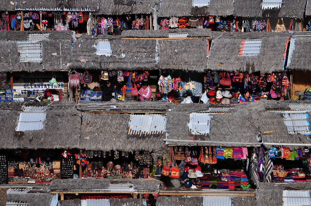 "A souvenir market in Peru viewed from above shows off the colorful wares and culture that its people are known for." See more of Ben's work <a href="http://www.flickr.com/photos/benalesh/">here</a>. Think you have what it takes to be featured as Photo of the Day? Submit your best work to our <a href="http://flickr.com/groups/1614596@N25/pool/">Flickr group</a>.