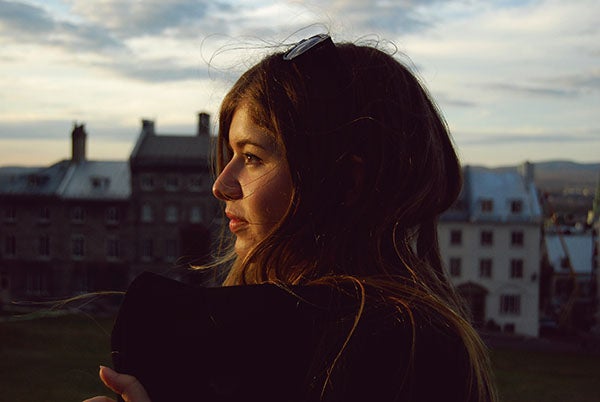 underexposed image of young woman