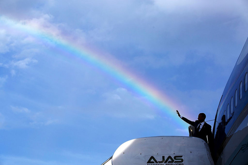President's wave aligns with a rainbow