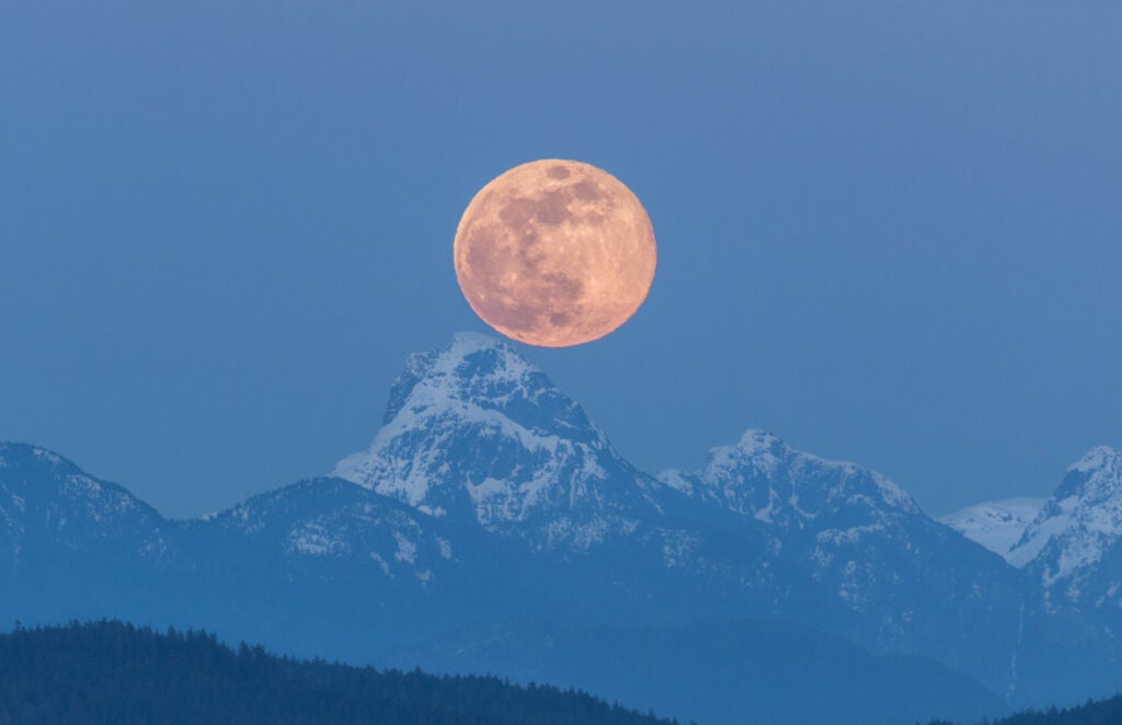 supermoon over mountain