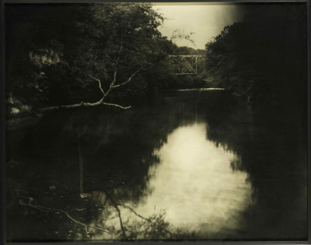 This large 40x50-inch tea-toned print, number 2 in an edition of 10, was printed in 1999 from Sally Mann's 1998 negative. But while it sold for $10,000, within its estimated range of $8,000–$12,000, other photographs by Mann in this auction failed to reach their reserve prices and were not sold. Among these was a unique ambrotype triptych of self-portraits from the summer of 2011, which had been estimated to be worth $40,000–$60,000.