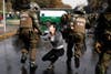 A demonstrator is detained during May Day rallies in Santiago, Chile. Ivan Alvarado is a Reuters staff photographer based in Chile. See more of his incredible images of protesting <a href="http://www.americanphotomag.com/photo-gallery/2012/07/photojournalism-week-july-13-2012?page=11">here</a> and <a href="http://www.americanphotomag.com/photo-gallery/2012/11/photojournalism-week-november-9-2012?page=3">here</a>.