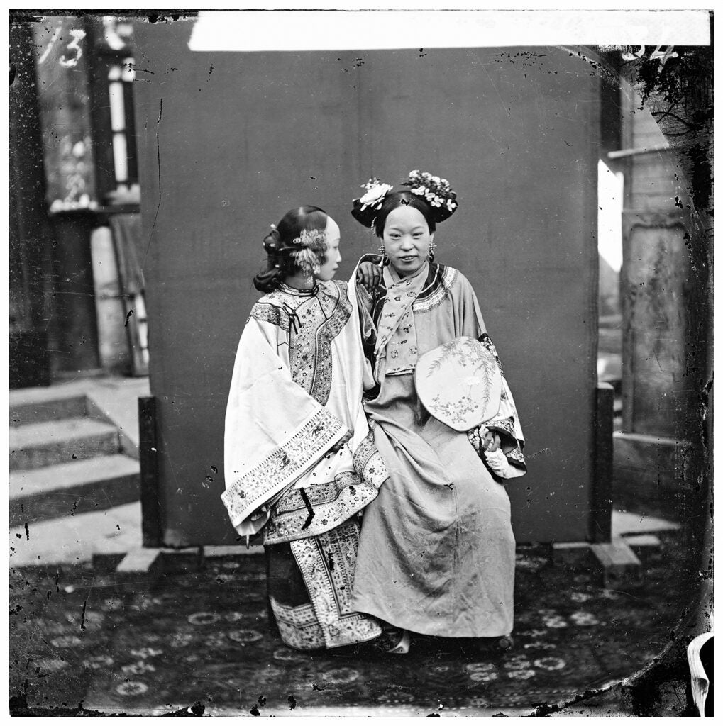 A Manchu lady after having her face painted, Beijing, 1871–72.