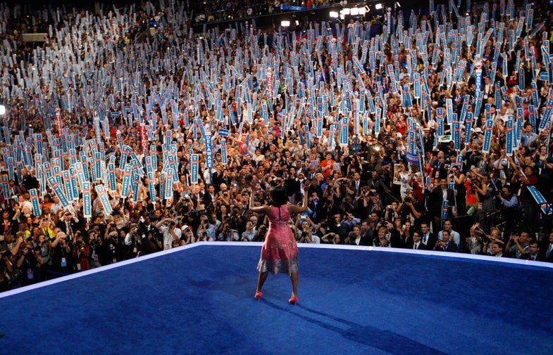 U.S. first lady Michelle Obama waves before addressing the first session of the Democratic National Convention in Charlotte, North Carolina September 4, 2012. REUTERS/Rick Wilking (UNITED STATES - Tags: POLITICS ELECTIONS)