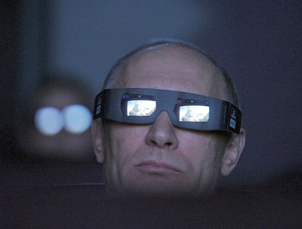 Russia’s ever-photogenic prime minister (now president-elect) Vladimir Putin watches a presentation at a Moscow planetarium on the 51st anniversary Yuri Gagarin's historic first space flight. Alexsey Druginyn is a Russian photographer whose work, for the most part, revolves around Putin’s every move.