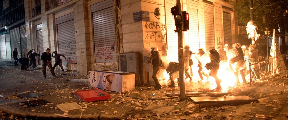 Getty Images stringer <a href="http://www.milosbicanski.com/projects.php">Milos Bicanski</a> captured this tense stand off in central Athens, Greece, between rioters throwing firebombs and police officers. Bicanski is a freelance photographer based in Athens who has spent the past year documenting immigration into the region. You can follow his work on his <a href="http://milosbicanski.blogspot.com/">blog</a>.