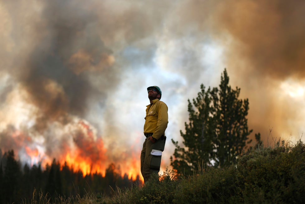 Firefighter Alex Abols monitors flames on the north flank of the Fontenelle Fire outside Big Piney, Wyoming. Over 800 firefighters are working 15-hour shifts battling the fire that has exceeded 56,000 acres. Jim Urquhart is a freelance photographer working for Reuters out of Salt Lake City, Utah. Check out more of his work on his <a href="http://straylighteffect.com/">Website</a>.