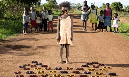 Children From Around the World, Posed With Their Favorite Toys