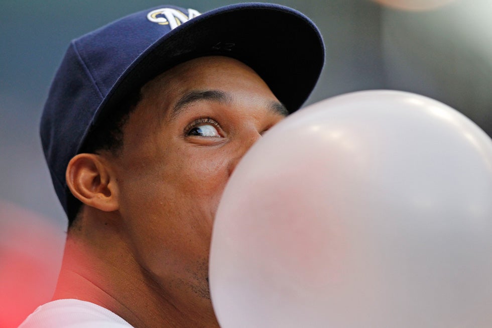 Milwaukee Brewer Carlos Gomez blows a massive bubble during the second inning of a game against the Toronto Blue Jays. Jeffrey Phelps is a freelance commercial photographer and former Milwaukee Journal Sentinel staffer of 20 years. See more of his work on his <a href="http://www.jeffreyphelps.com/">personal site</a>.