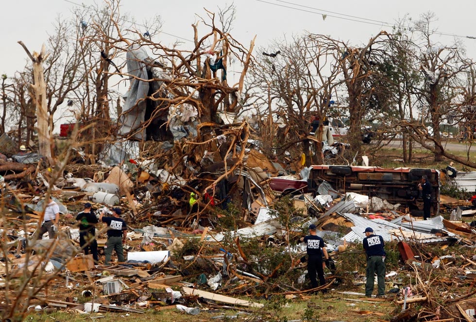 Rescue workers comb through debris after tornados swept through the town of Granbury, Texas late May 15, 2013. At least six people were killed and about 100 injured. Richard Rodriguez is a Reuters staffer based in Texas.
