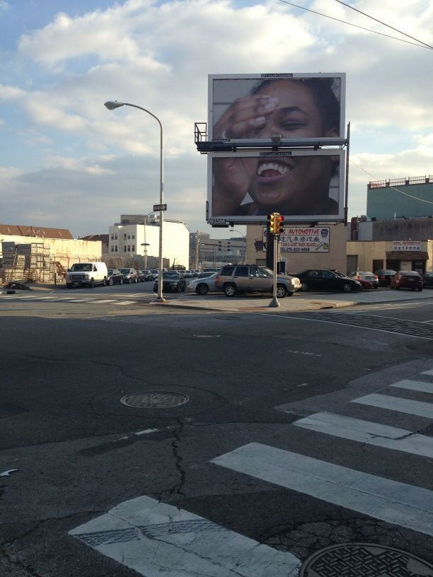 [Billboard 50](http://zoestraussbillboardproject.c) \- “Woman Laughing in Indiana, 1, (2 panel image)” Central Indiana