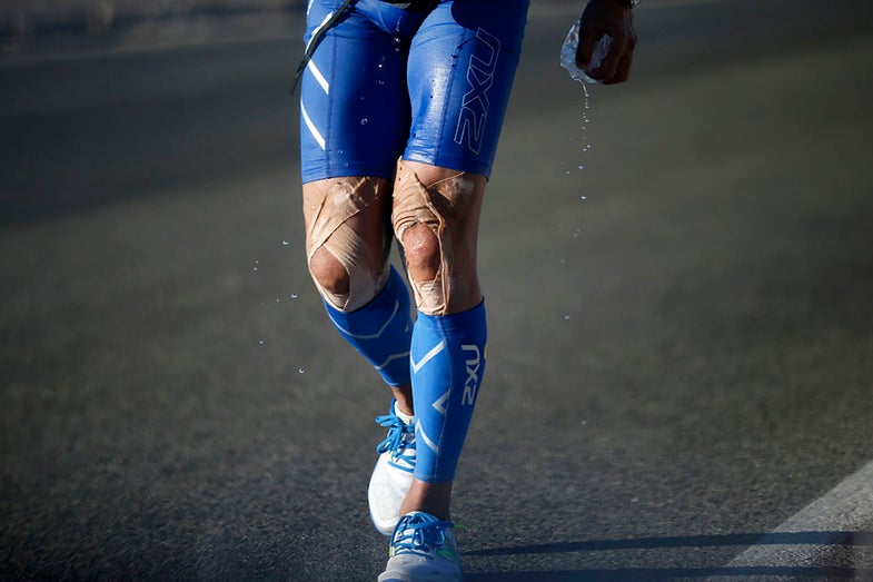 A competitor runs with bandaged knees during the Badwater Ultramarathon in Death Valley National Park, California July 15, 2013. The 135-mile (217 km) race, which bills itself as the world's toughest foot race, goes from Death Valley to Mt. Whitney, California in temperatures which can reach 130 degrees Fahrenheit (55 Celsius). REUTERS/Lucy Nicholson (UNITED STATES - Tags: SPORT ATHLETICS ENVIRONMENT) - RTX11O14