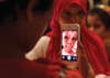 Reuters photojournalist Ali Jarekji made this image of a child snapping a photo with a mobile phone at a party in Amman, Jordan, for Iraqi and Syrian children injured by violence. According to a UN report, half of Syria’s 1.7 million refugees are children, while in Iraq, hundreds of children each year are killed or maimed, typically by improvised explosive devices. In this quiet, personal moment amid the celebration of Eid al-Fitr, the feast that breaks the fast at the end of Ramadan, the child’s nationality is unclear—and irrelevant. Jarekji defines a universal message in a most intimate way.