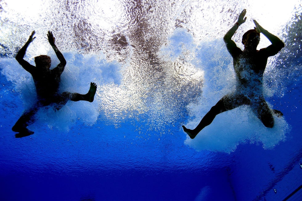 Getty Images staff photographer Clive Rose captured this underwater image during the Men's three-meter springboard synchronized diving final held in London this week. An extremely well accomplished sports photographer, Rose shoots everything from the Olympic games, to European soccer, to swimming and diving to Formula One racing. You can follow him on Twitter <a href="https://twitter.com/#!/cliverose">here</a>.