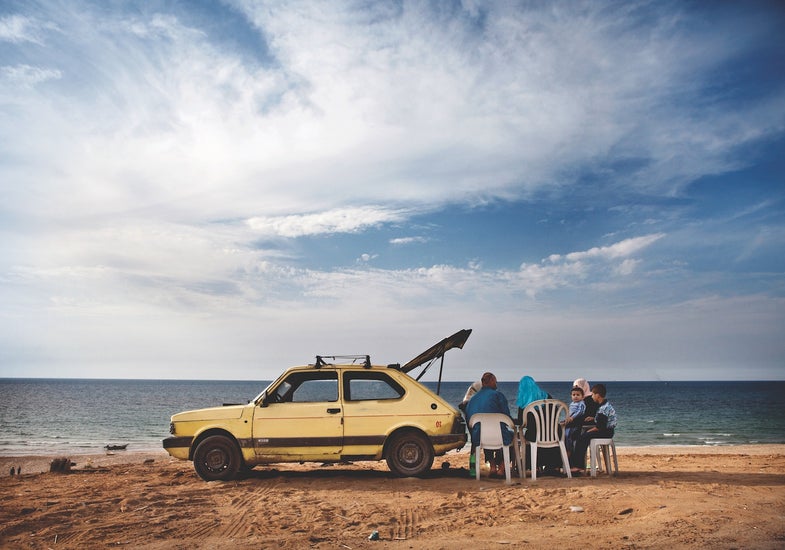 A family in Gaza City enjoys a picnic on the beach.