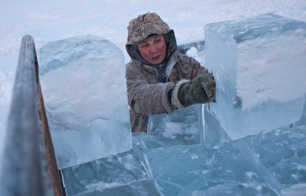Ruslan, 35, loads blocks of ice onto a truck outside Yakutsk in the Republic of Sakha, northeast Russia. The coldest temperatures in the northern hemisphere have been recorded in Sakha, the location of the Oymyakon valley, where according to the United Kingdom Met Office, a temperature of -90 degrees Fahrenheit was registered in 1933. Maxim Shemetov is a Reuters staffer based in Russia. See more of his work in our past round-ups <a href="http://www.americanphotomag.com/photo-gallery/2012/11/photojournalism-week-november-9-2012?page=5">here</a>.