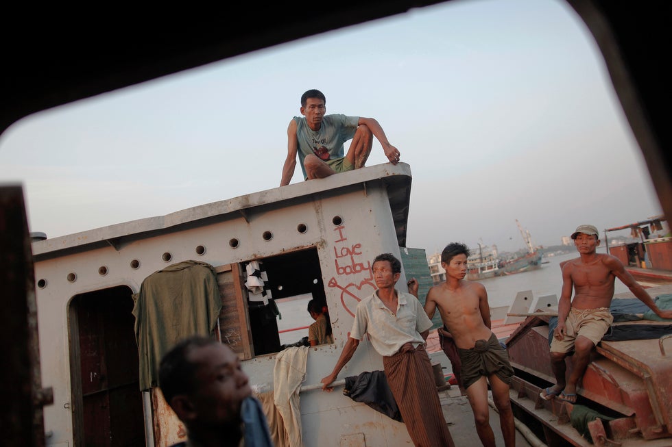 A large number of Myanmar's citizens live on abandoned ships docked on a river outside Yangon. Damir Sagolj is an accomplished Reuters photographer. He recently won first prize in the World Press Photo Daily Life Singles category. He has a very active blog over on the Reuters site, that is definitely worth <a href="http://blogs.reuters.com/damir-sagolj/">checking out</a>. **Warning: the following image contains graphic content. **