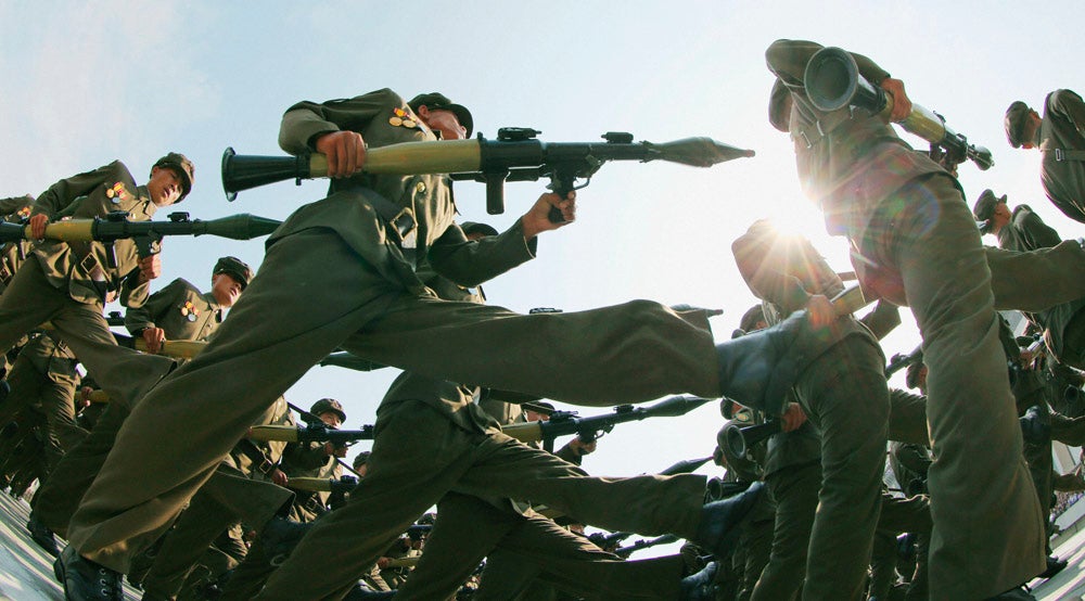 North Korea's Worker-Peasant Red Guard members attend a parade marking the 1948 establishment of North Korea, in Pyongyang in this photo taken by Kyodo September 9, 2013.   Mandatory Credit. REUTERS/Kyodo (NORTH KOREA - Tags: POLITICS MILITARY ANNIVERSARY TPX IMAGES OF THE DAY) 

ATTENTION EDITORS - THIS IMAGE WAS PROVIDED BY A THIRD PARTY. FOR EDITORIAL USE ONLY. NOT FOR SALE FOR MARKETING OR ADVERTISING CAMPAIGNS. THIS PICTURE IS DISTRIBUTED EXACTLY AS RECEIVED BY REUTERS, AS A SERVICE TO CLIENTS. MANDATORY CREDIT. JAPAN OUT. NO COMMERCIAL OR EDITORIAL SALES IN JAPAN - RTX13DT7