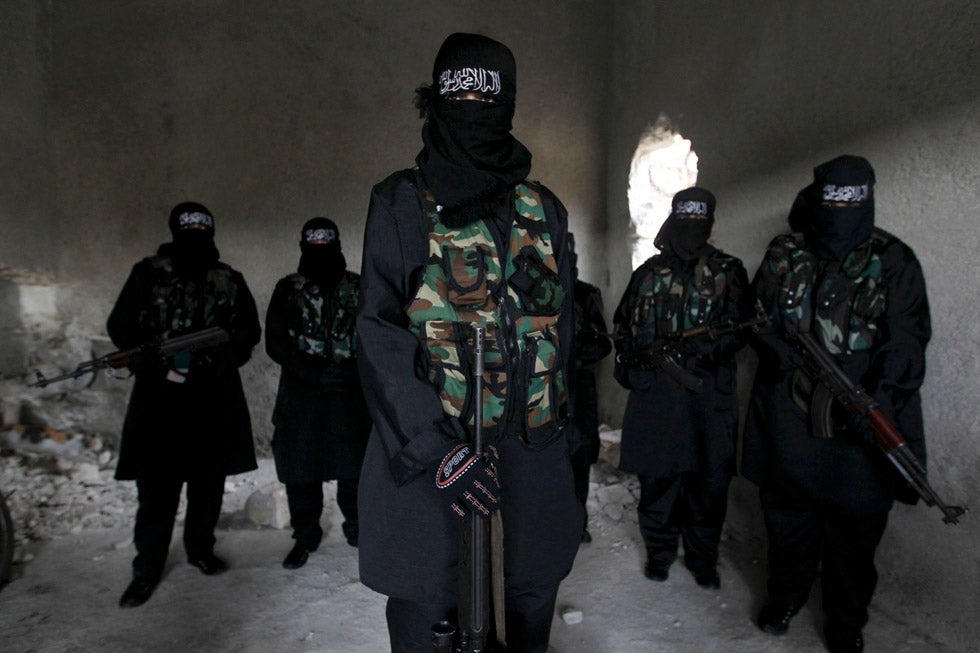 Women, who are part of the Sawt al-Haq (Voice of Rights), stand with their weapons as they undergo military training in Aleppo, Syria. Muzaffar Salman is a freelance photojournalist working for Reuters in Syria. See more of his work <a href="http://www.americanphotomag.com/photo-gallery/2012/02/best-photojournalism-week-february-24-2012?page=7">here</a>.