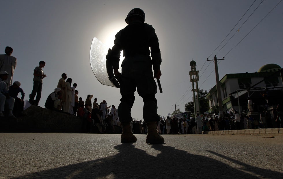 A riot policeman keeps watch during a demonstration in Kabul, Afghanistan. Omar Sobhani is Reuters staff photographer who up until this year, was based in Iraq. See more of his work in our past galleries <a href="http://www.americanphotomag.com/photo-gallery/2012/08/photojournalism-week-august-17-2012?page=2">here</a> and <a href="http://www.americanphotomag.com/photo-gallery/2012/04/photojournalism-week-april-20-2012?page=5">here</a>.